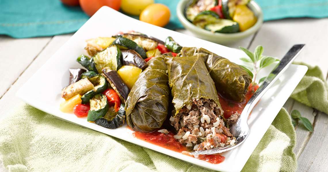 Beef Stuffed Grape Leaves with Tomato Sauce