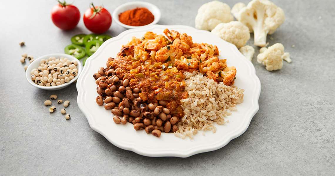 Spicy Black-Eyed Pea Curry with Harissa Cauliflower